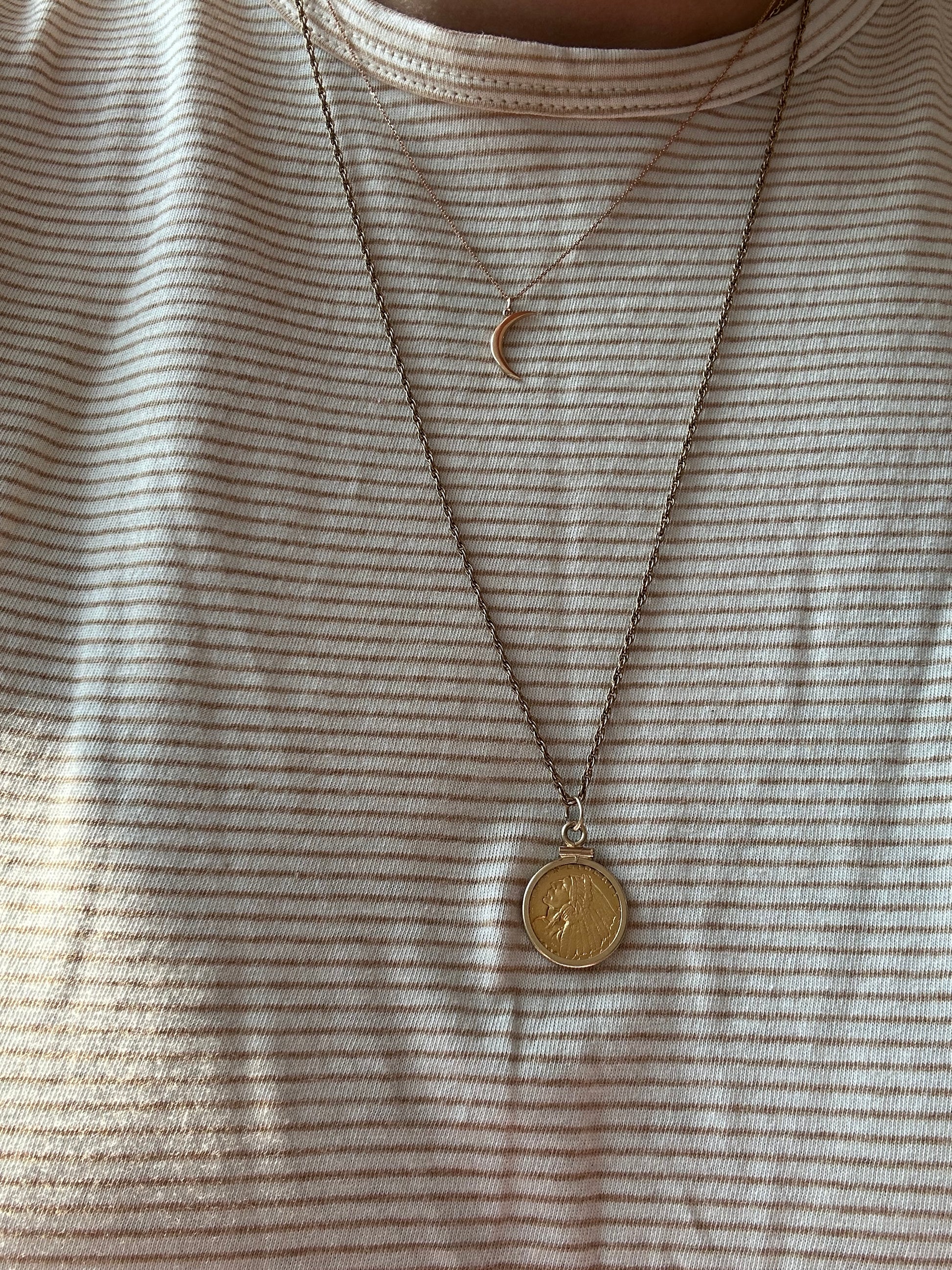 $2.5 Indian Gold Quarter in bezel