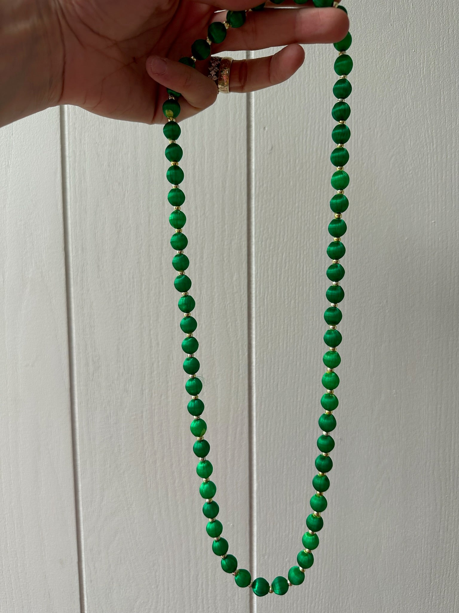 Colorful thread beads with gold plated bead strands
