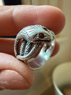 silver and garnet snake ring