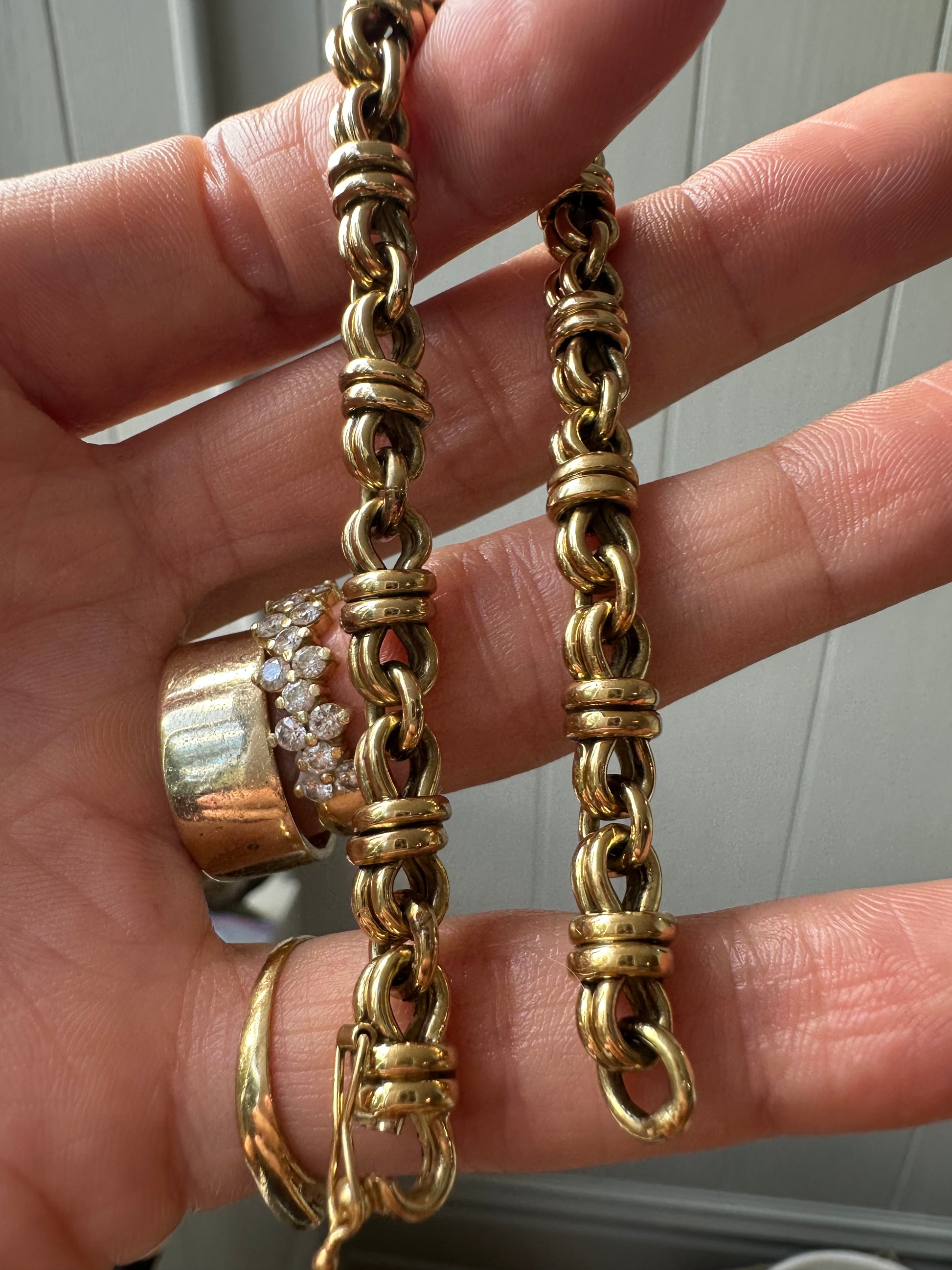 high karat knot bracelet with hidden clasp