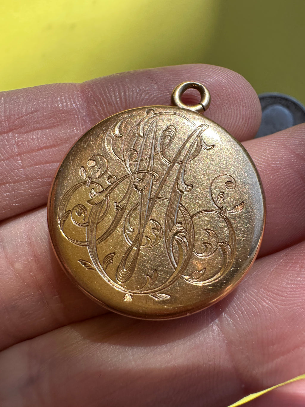 antique round engraved locket
