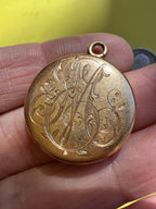 antique round engraved locket