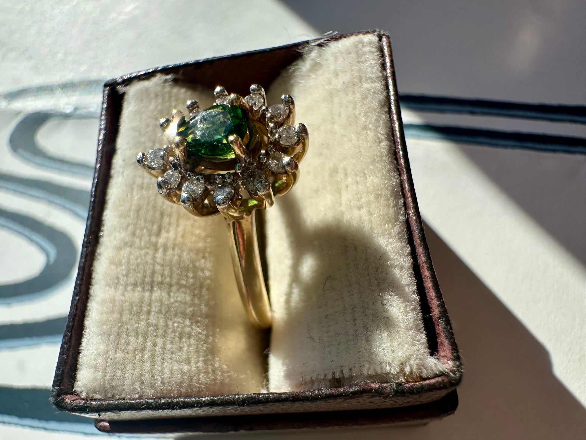 tsavorite garnet and diamond halo ring