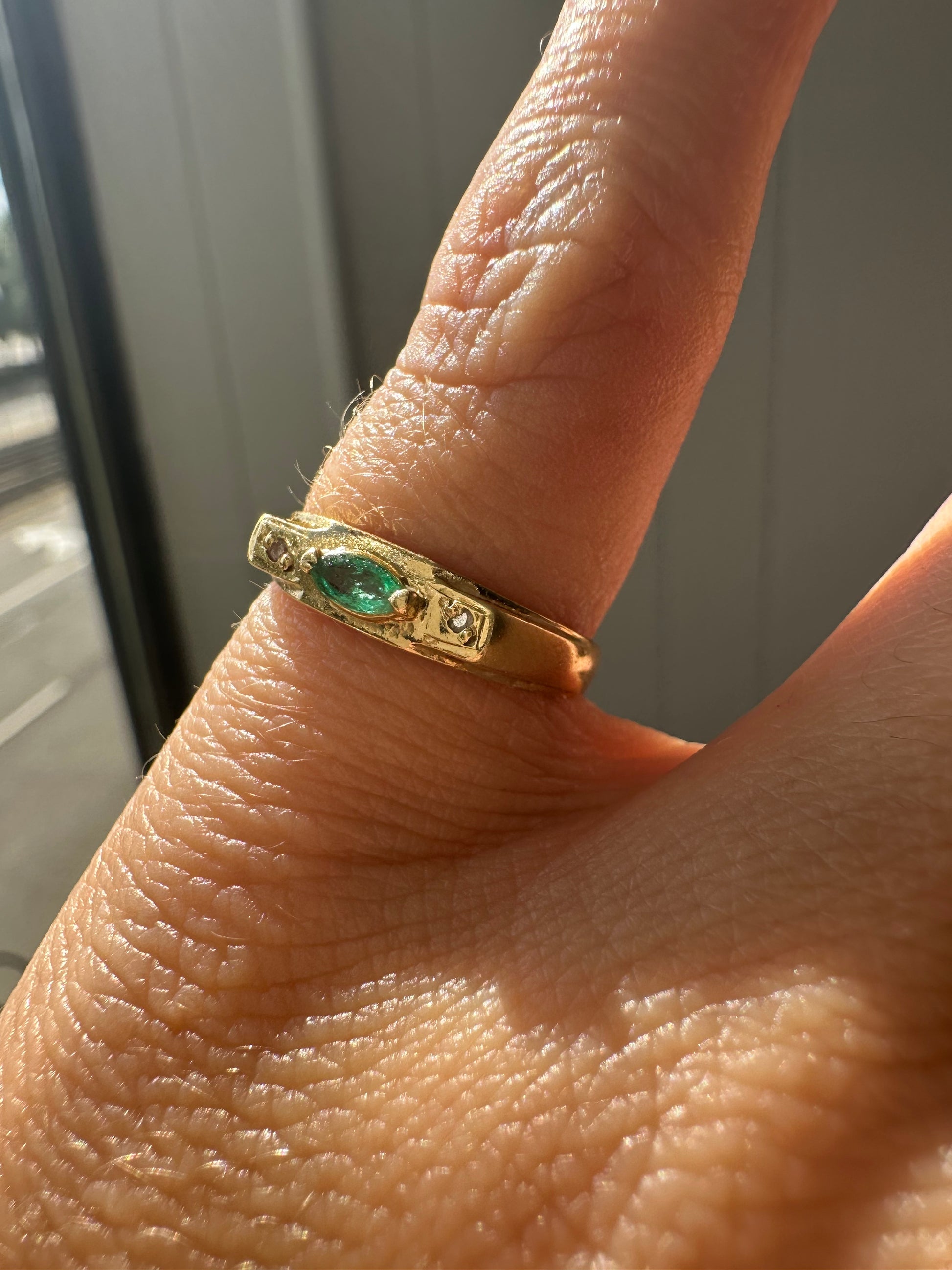 east west marquise emerald in 18k gold