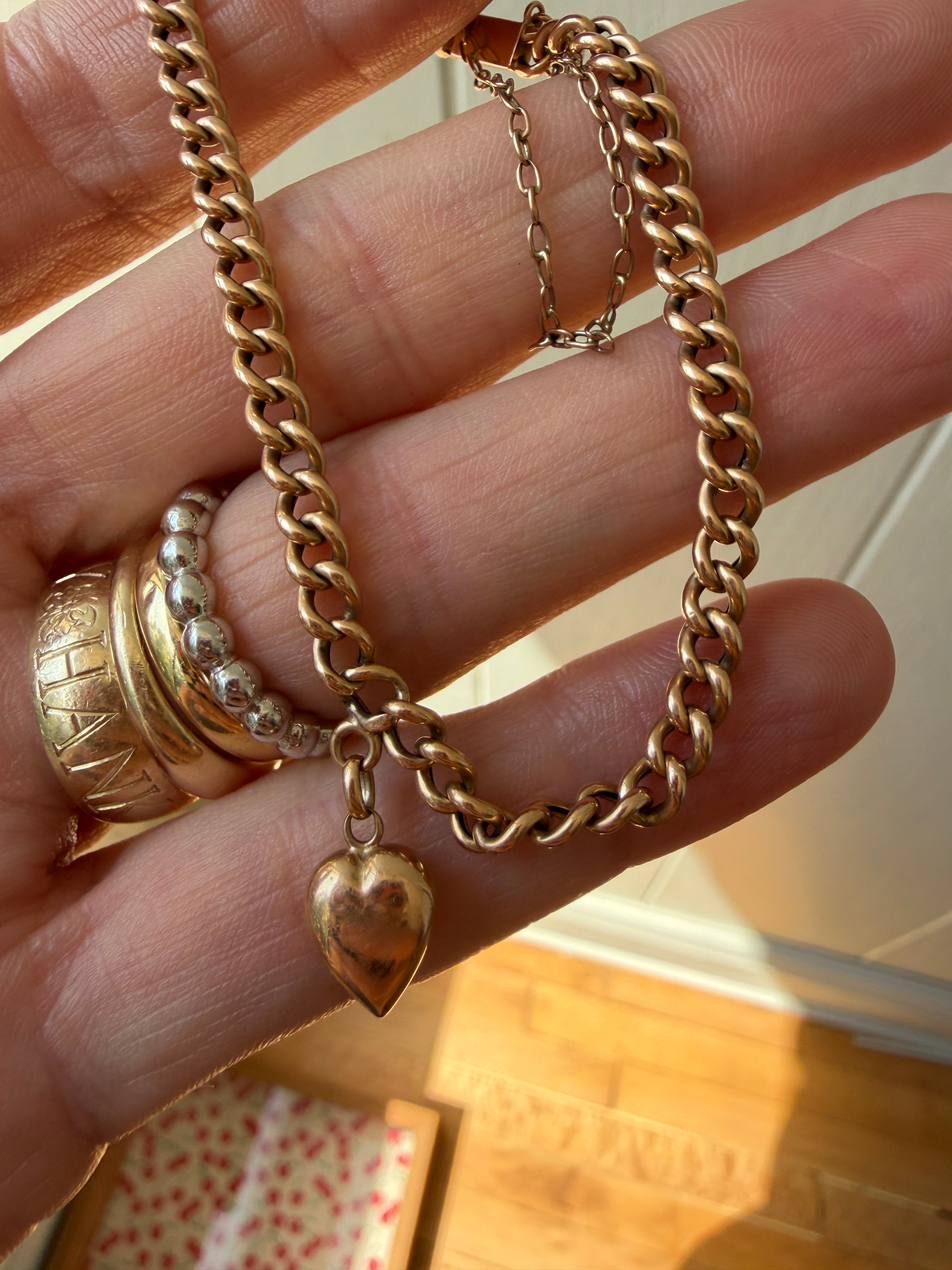 vintage/antique curb bracelet with star set single cut diamond heart
