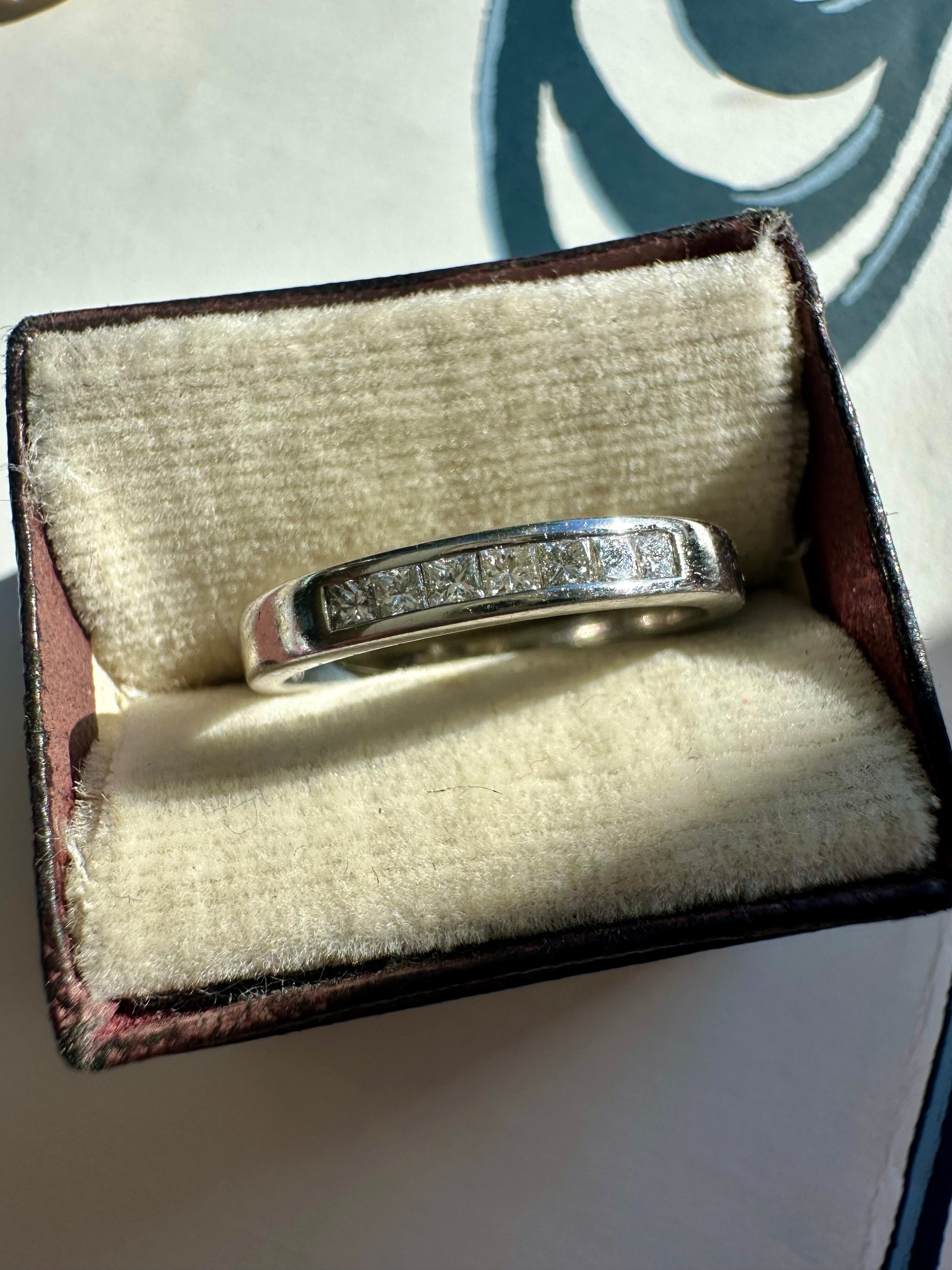 squared off white gold princess cut diamond band