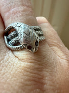 silver and garnet snake ring
