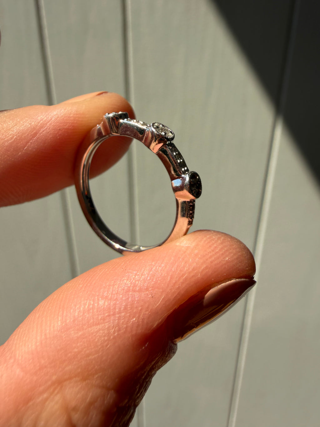 white gold and bezel set milgrain diamonds