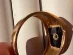 onyx and gold arrow ring