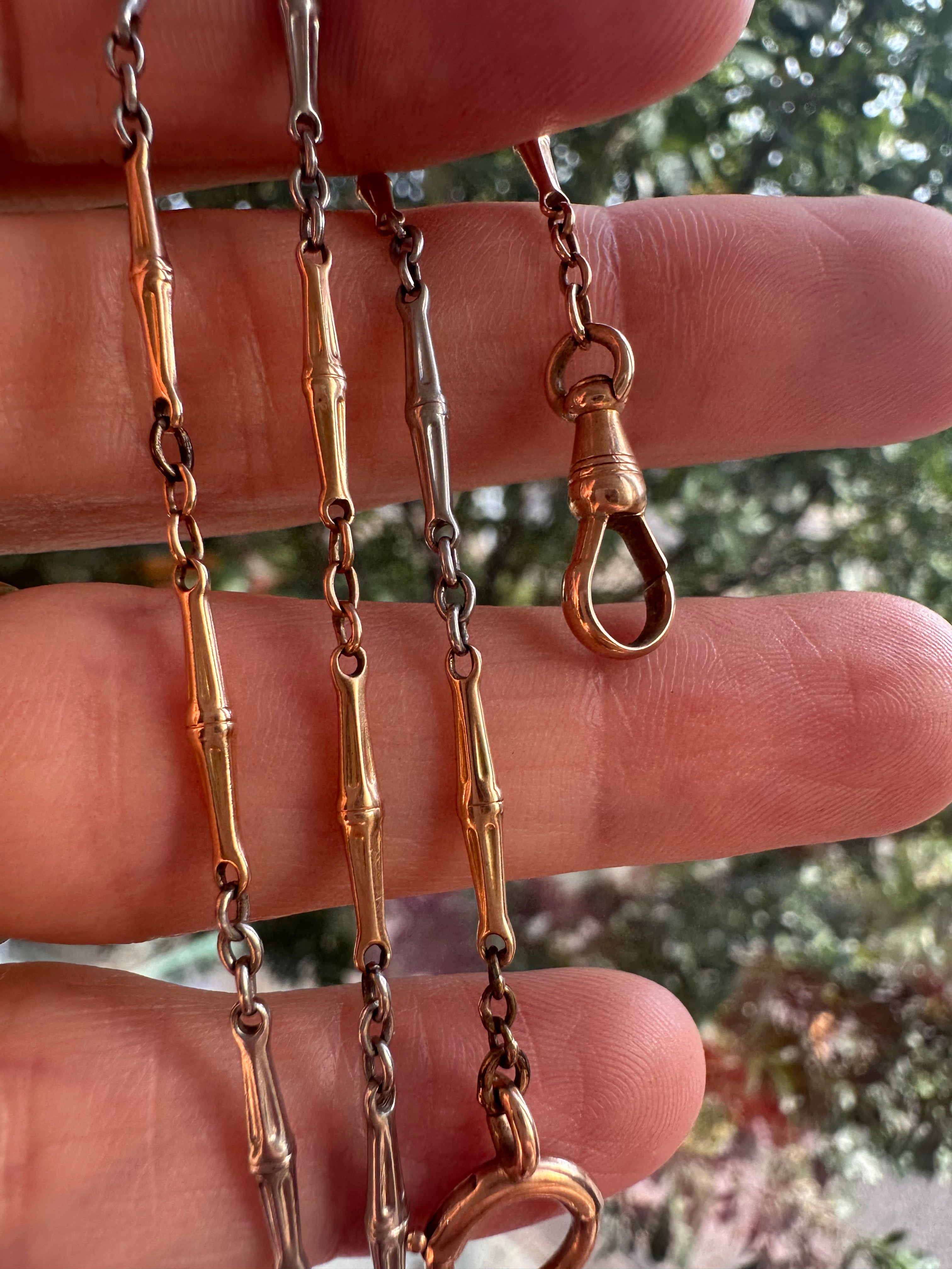 15  5/8" two tone rosy and white watch chain