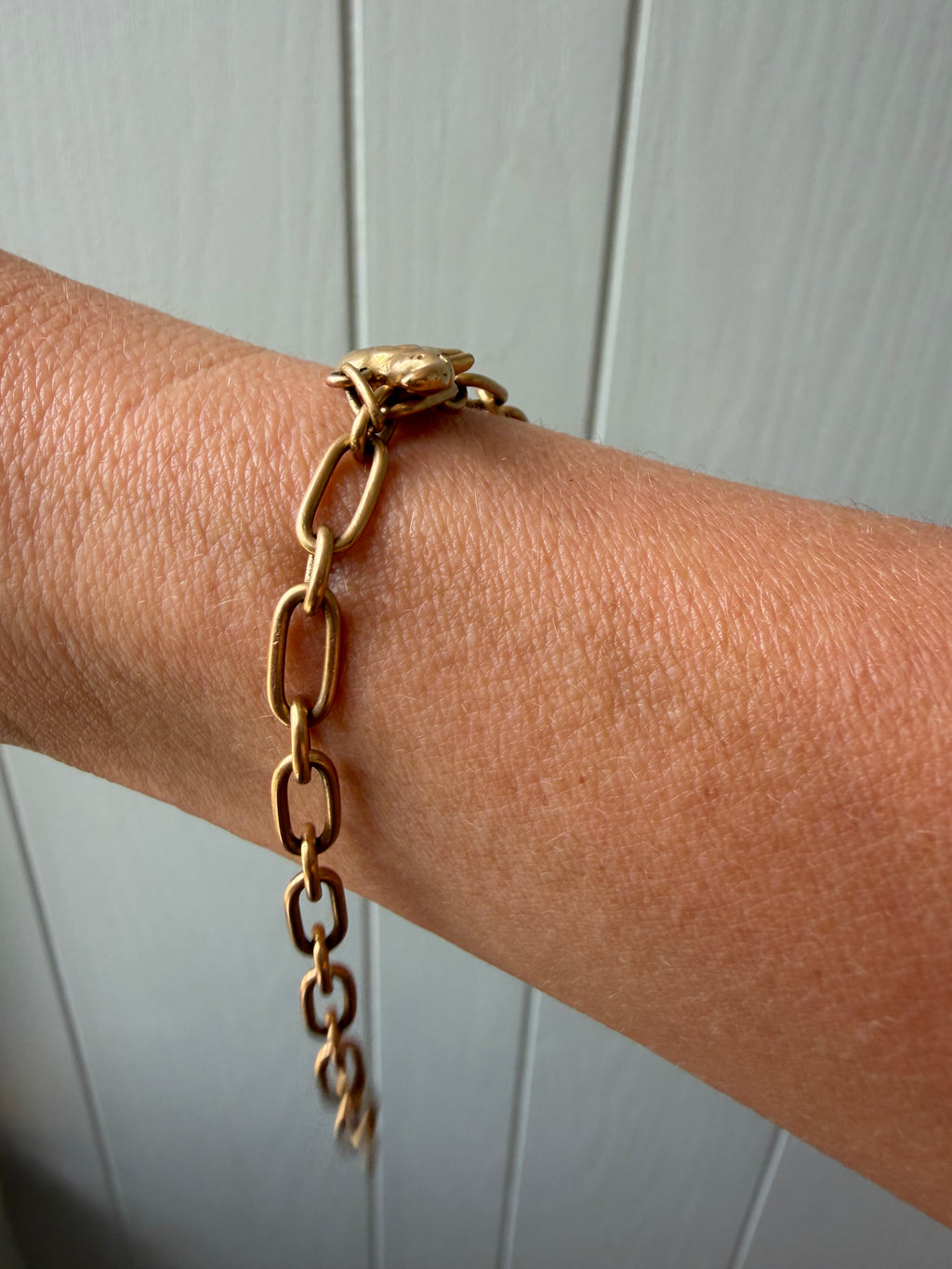 18k gold oval link with puffy elephant bracelet