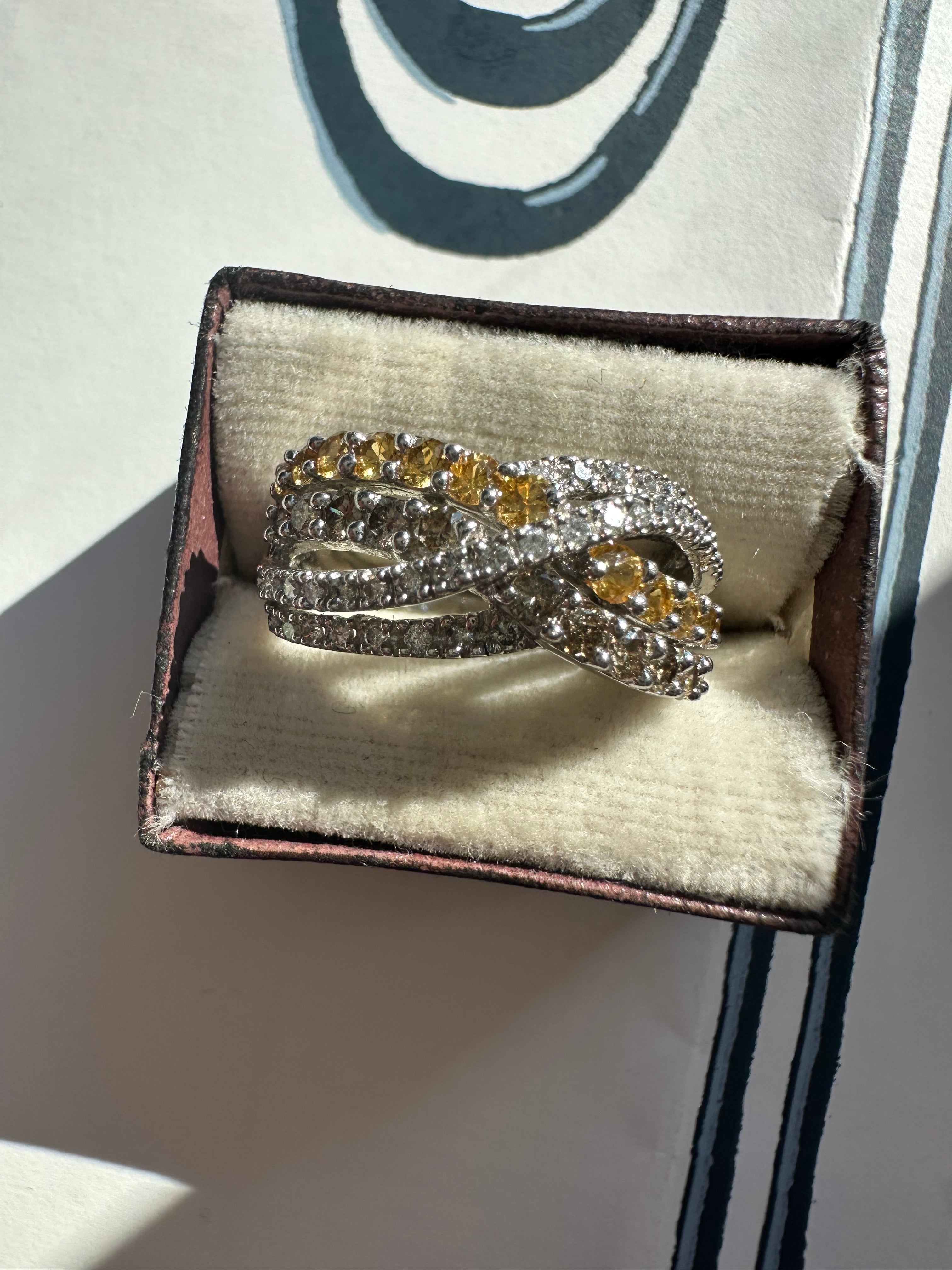 yellow sapphire and diamond crossover ring