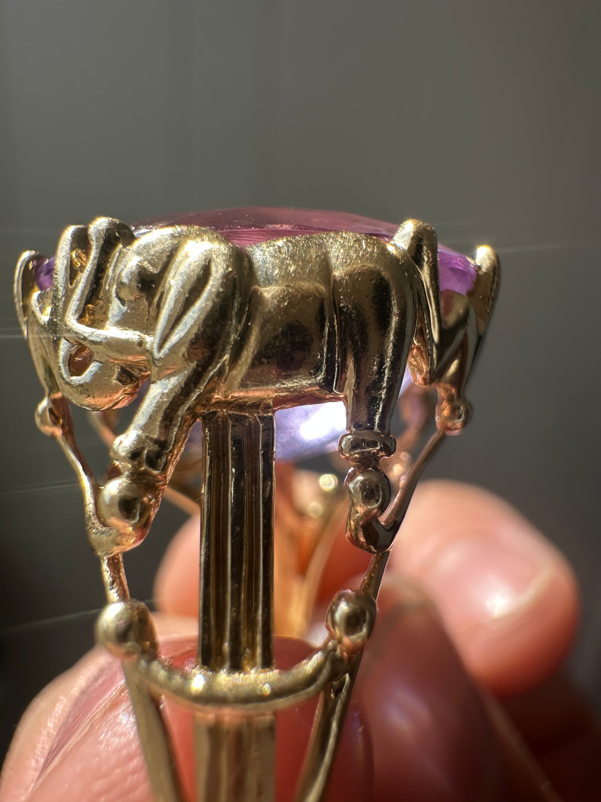 amethyst cocktail ring with elephant mounting