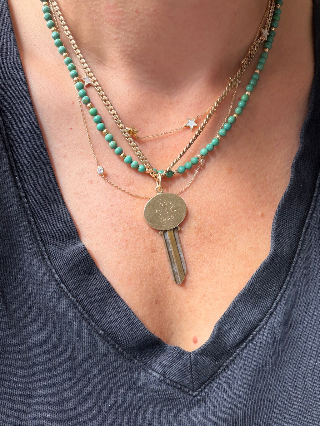 antique oval key pendant by Tiffany & Co.