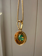 emerald in 18k bezel