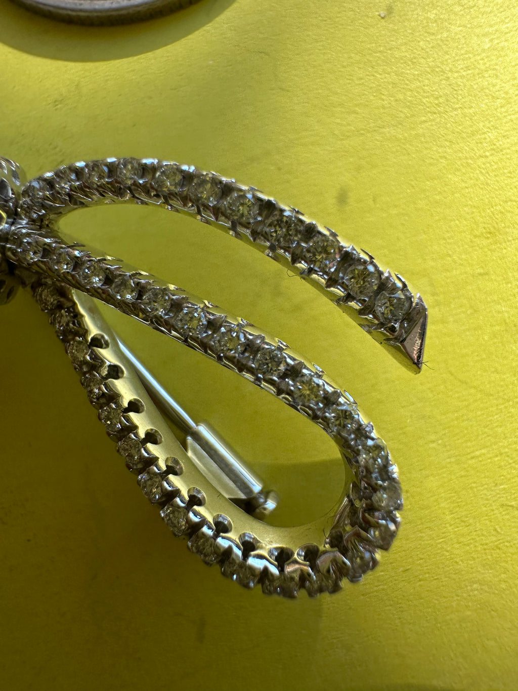 spectacular 18k white gold and diamond bow