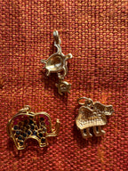 plethora of vintage gold charms