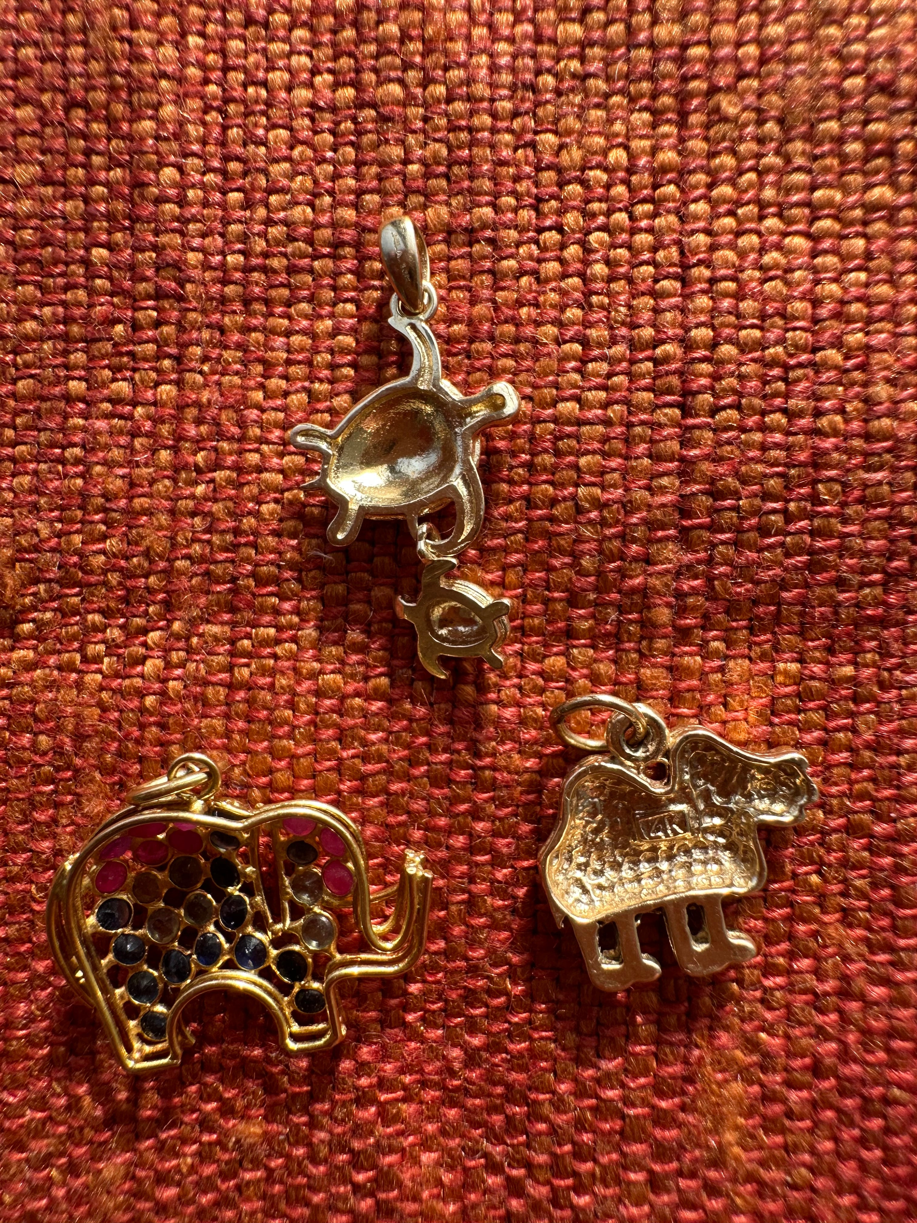 plethora of vintage gold charms
