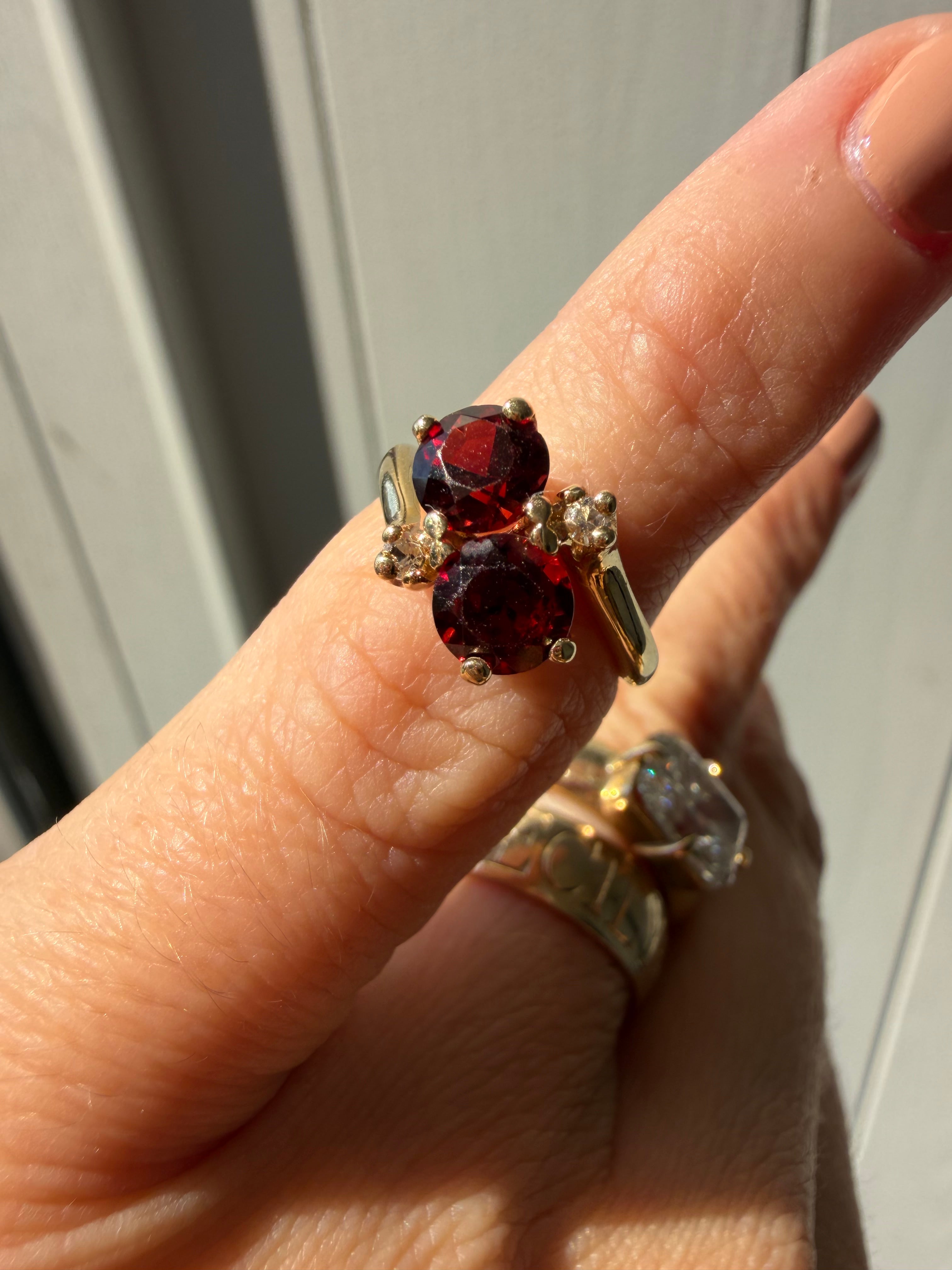 toi et moi garnet and diamond ring