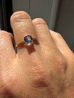 round cut solitaire tanzanite in 9k gold