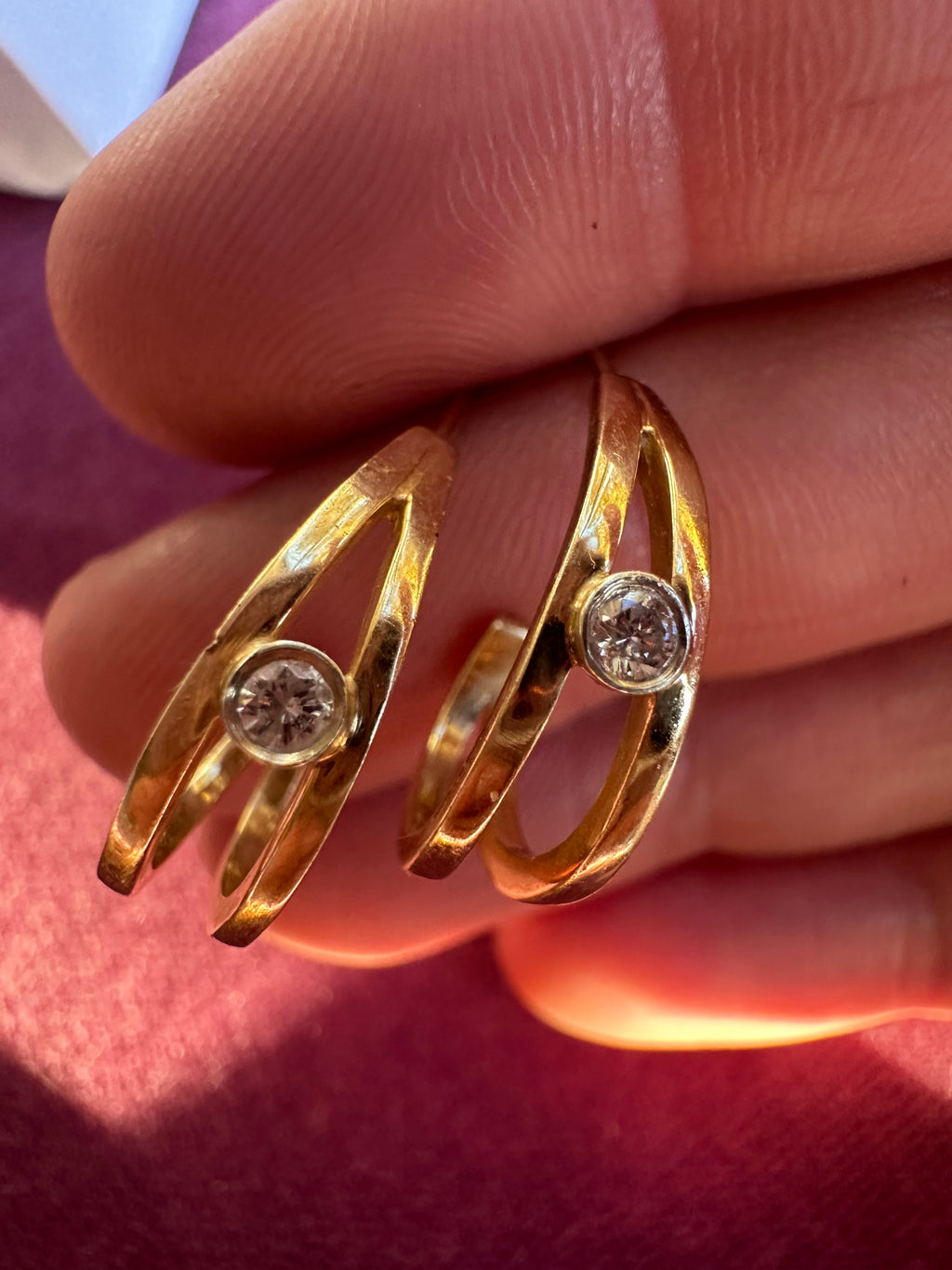 double J with bezel set diamond