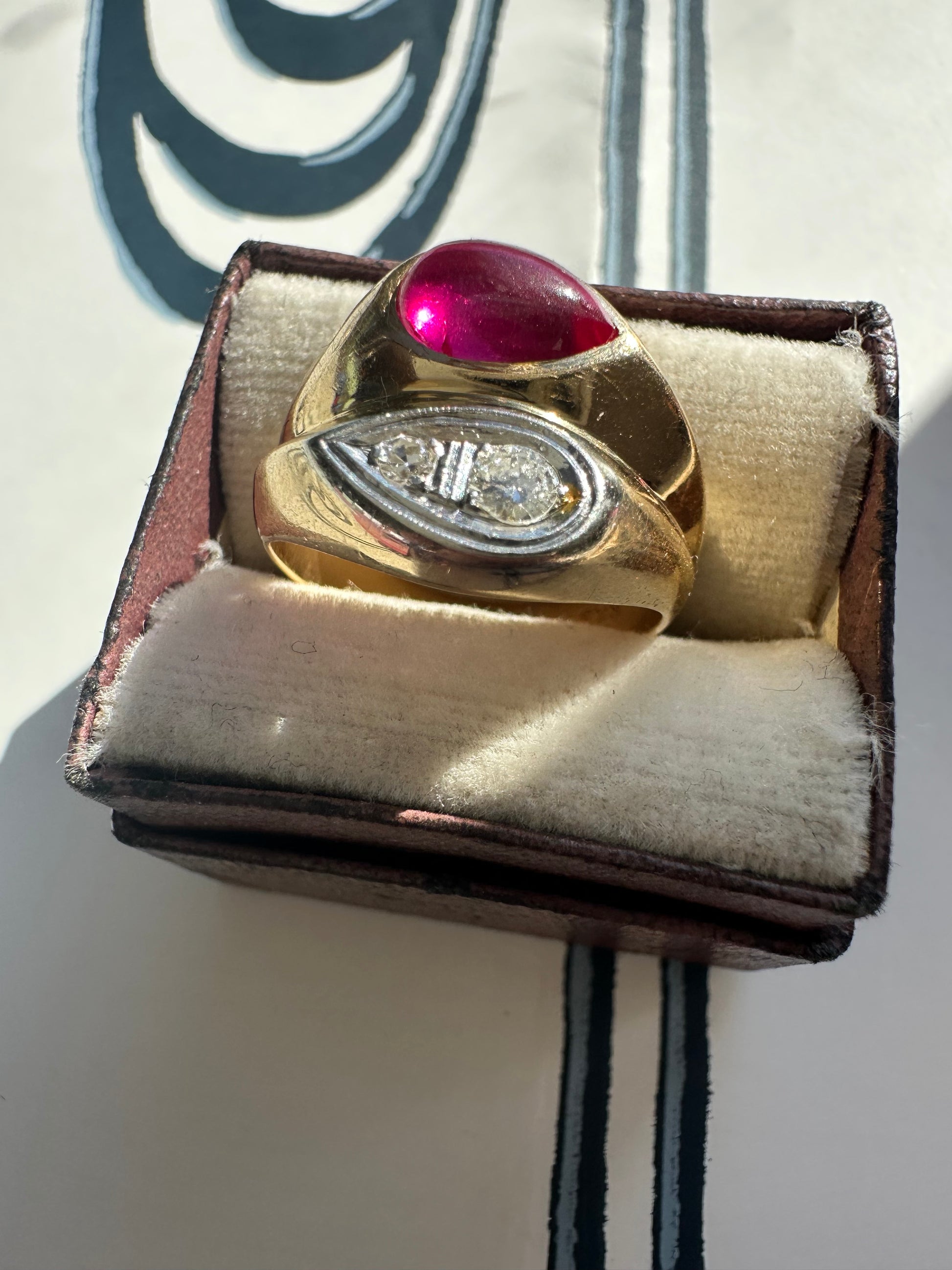 ruby cabochon and diamond side by side ring
