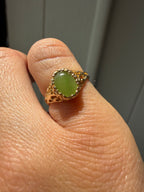 open work bezel set oval jade