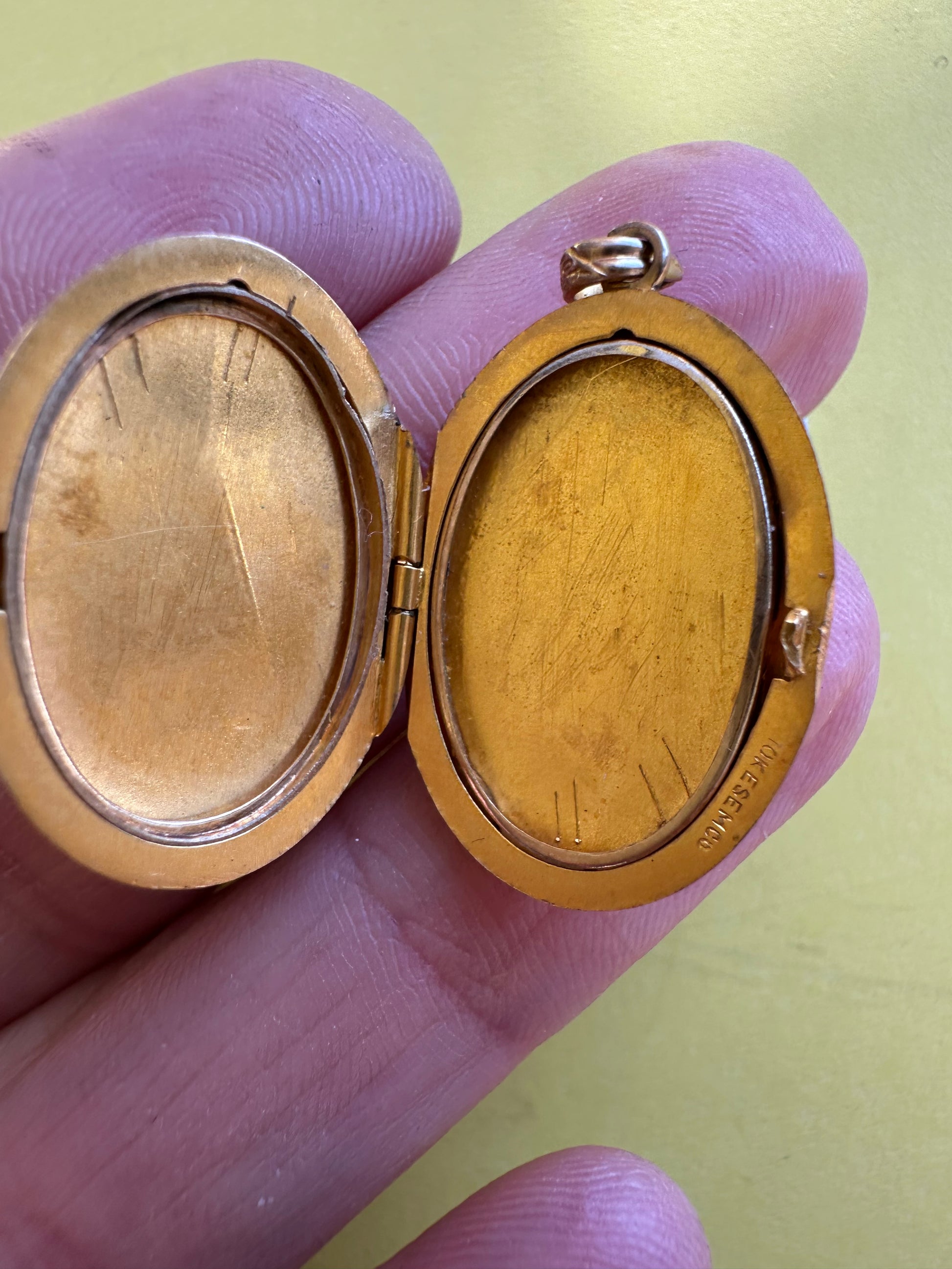 vintage oval locket with triangle