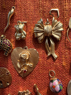plethora of vintage gold charms
