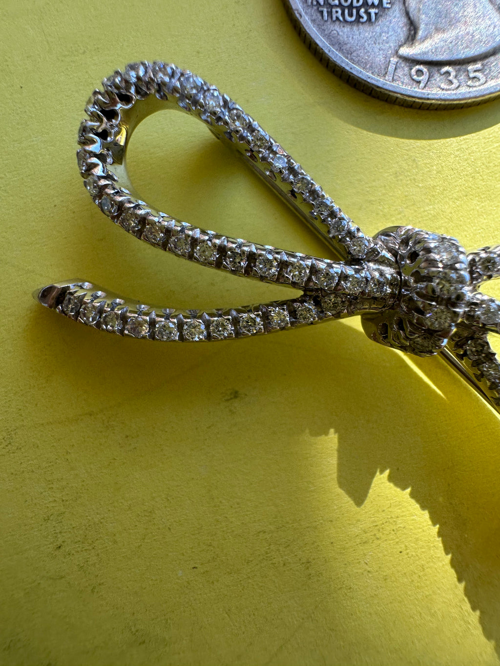 spectacular 18k white gold and diamond bow