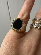 onyx and diamond oval signet style ring