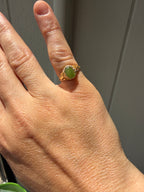open work bezel set oval jade