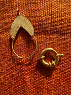 plethora of vintage gold charms