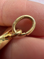antique oval key pendant by Tiffany & Co.