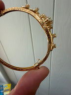 striking engraved opal burst hinge bangle