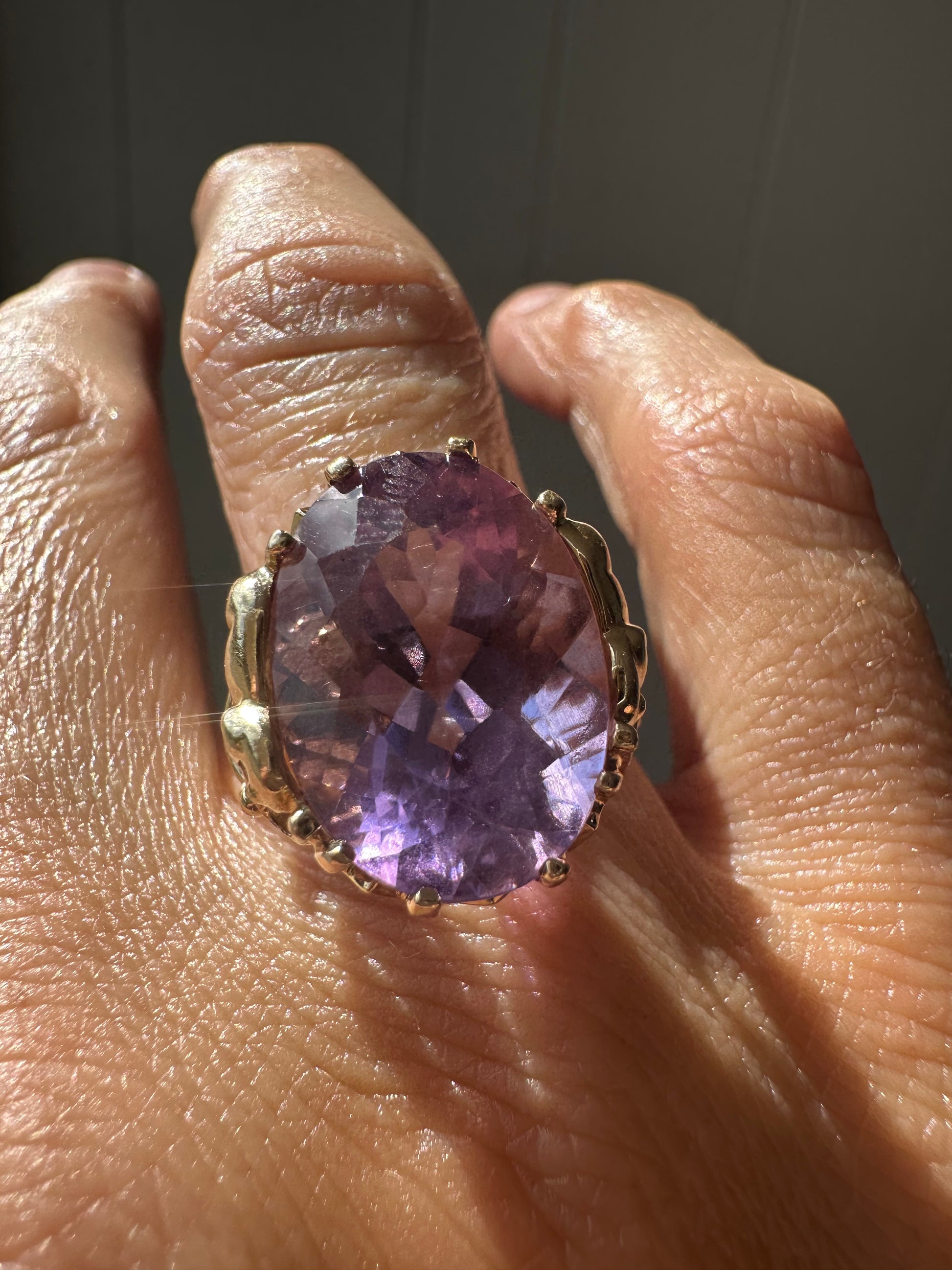 amethyst cocktail ring with elephant mounting