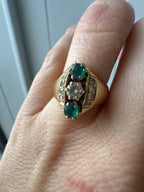emerald and diamond navette style ring
