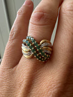 emerald and diamond swoop ring
