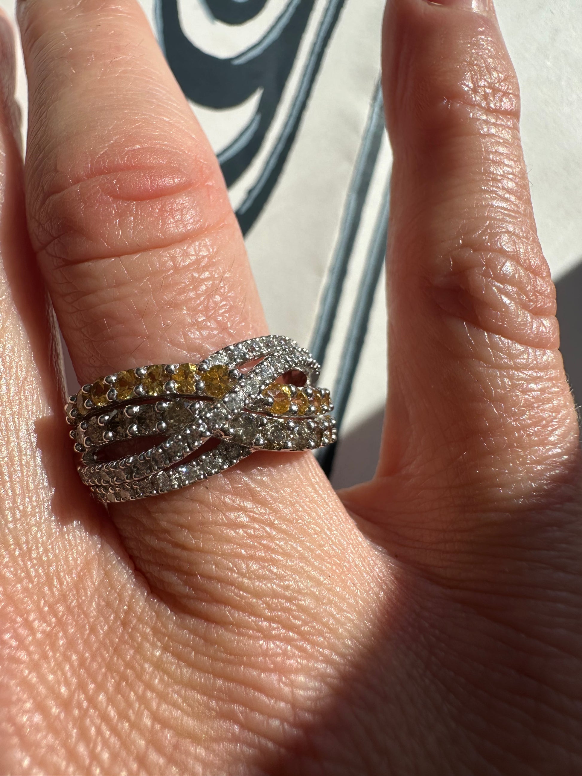 yellow sapphire and diamond crossover ring