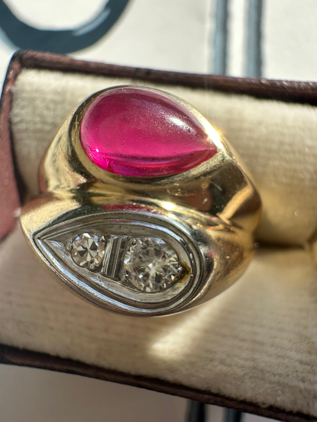 ruby cabochon and diamond side by side ring