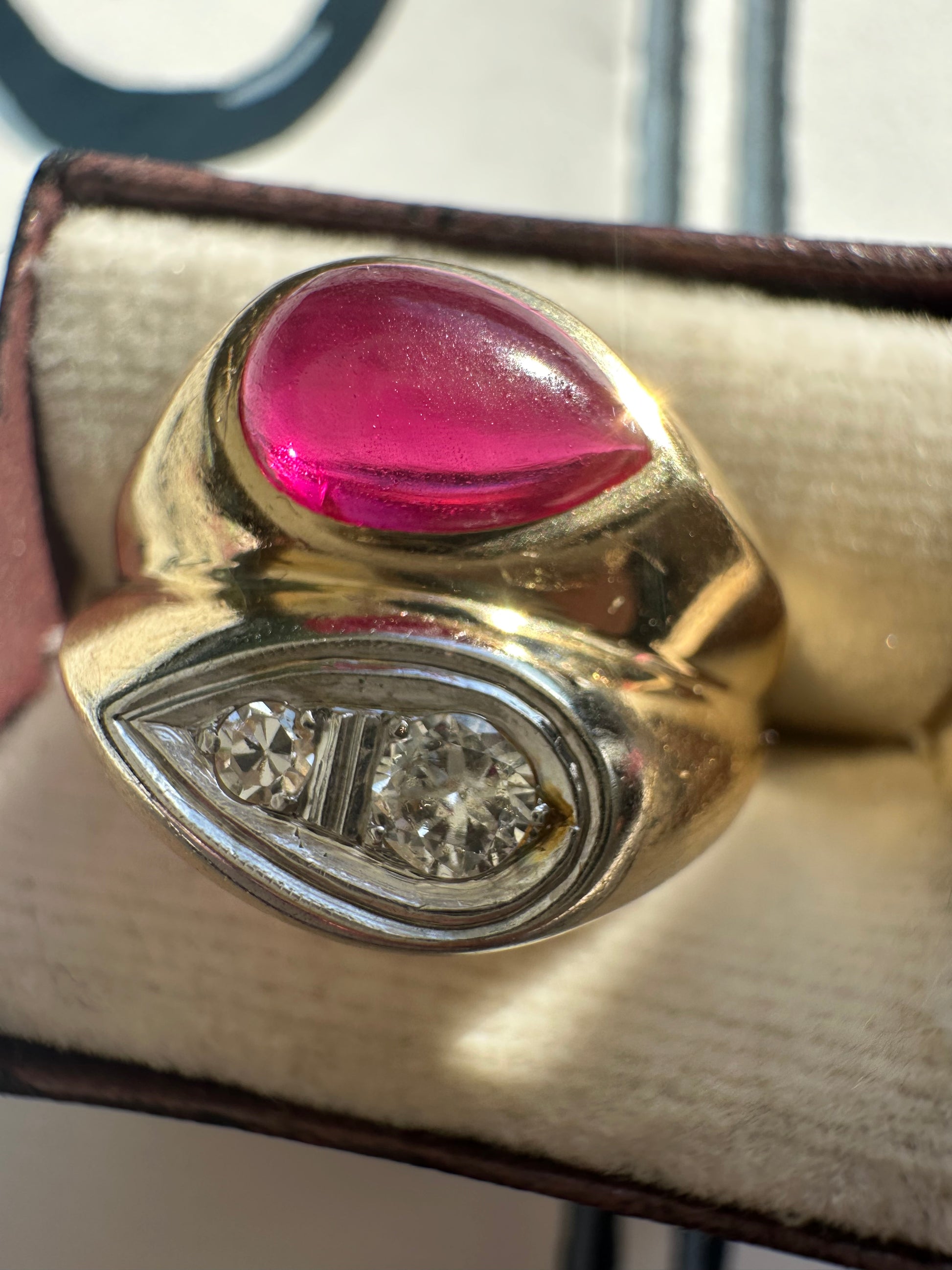 ruby cabochon and diamond side by side ring