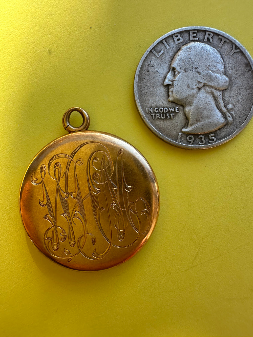antique round engraved locket