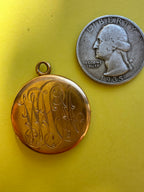 antique round engraved locket
