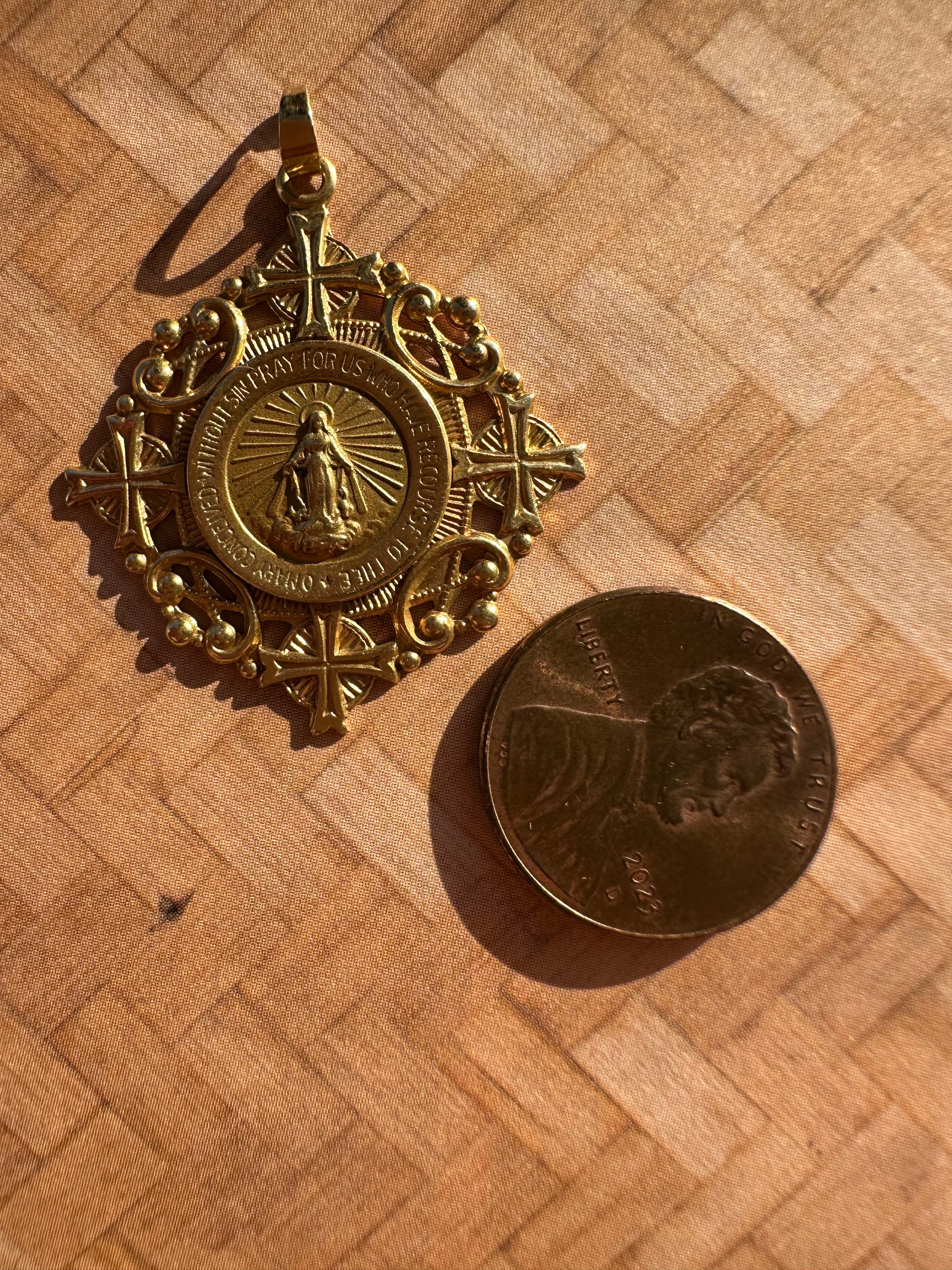 religious charms and pendants