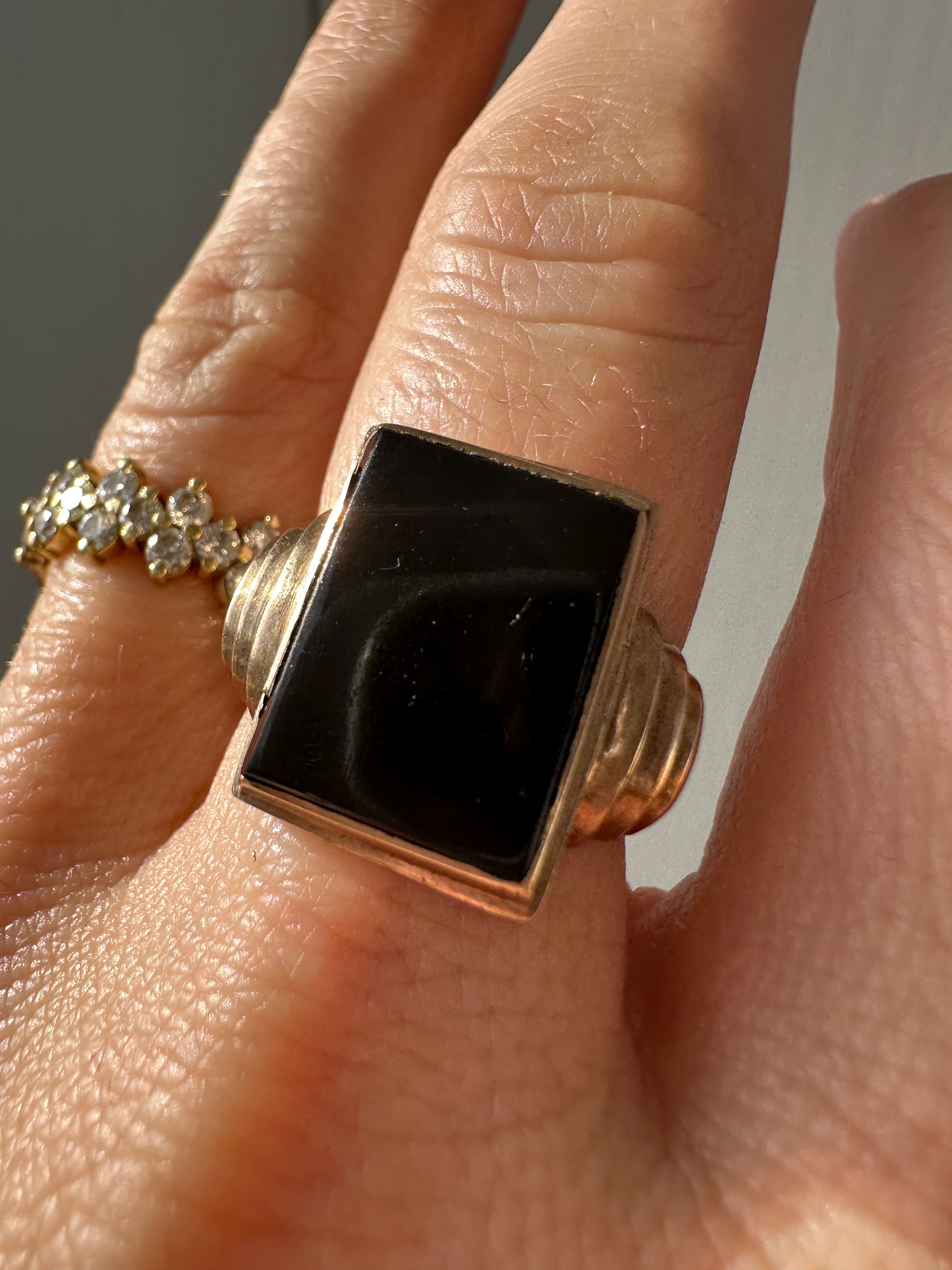 rosy gold and onyx vintage ring