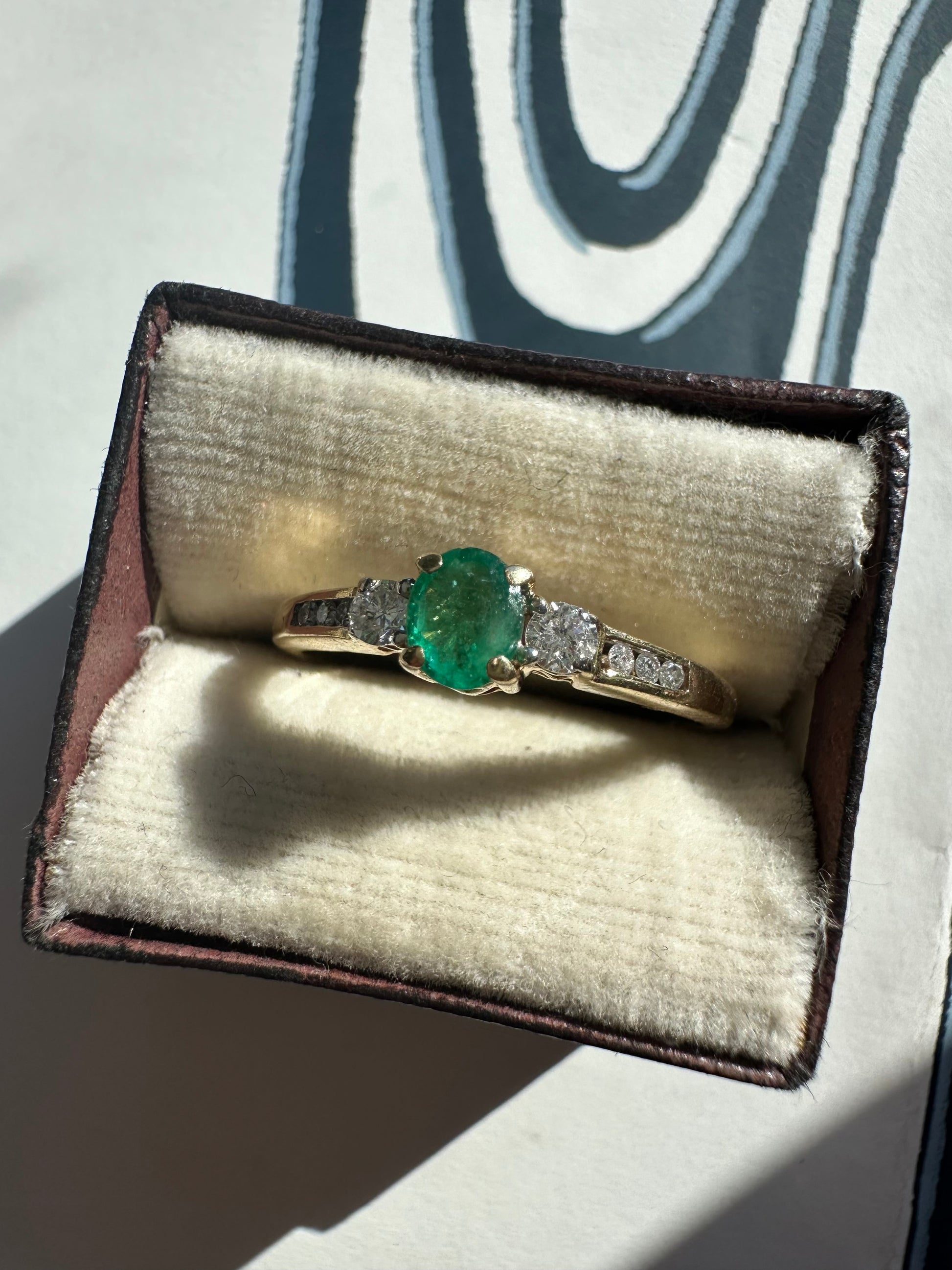 emerald and diamond ring
