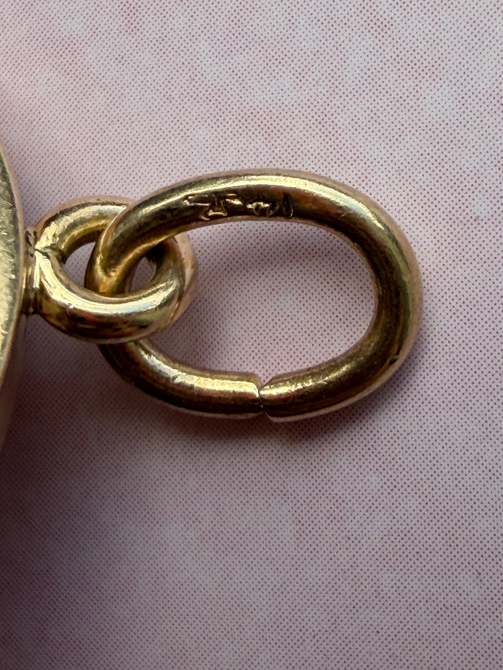antique oval key pendant by Tiffany & Co.