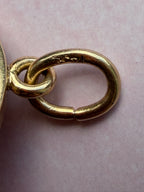antique oval key pendant by Tiffany & Co.