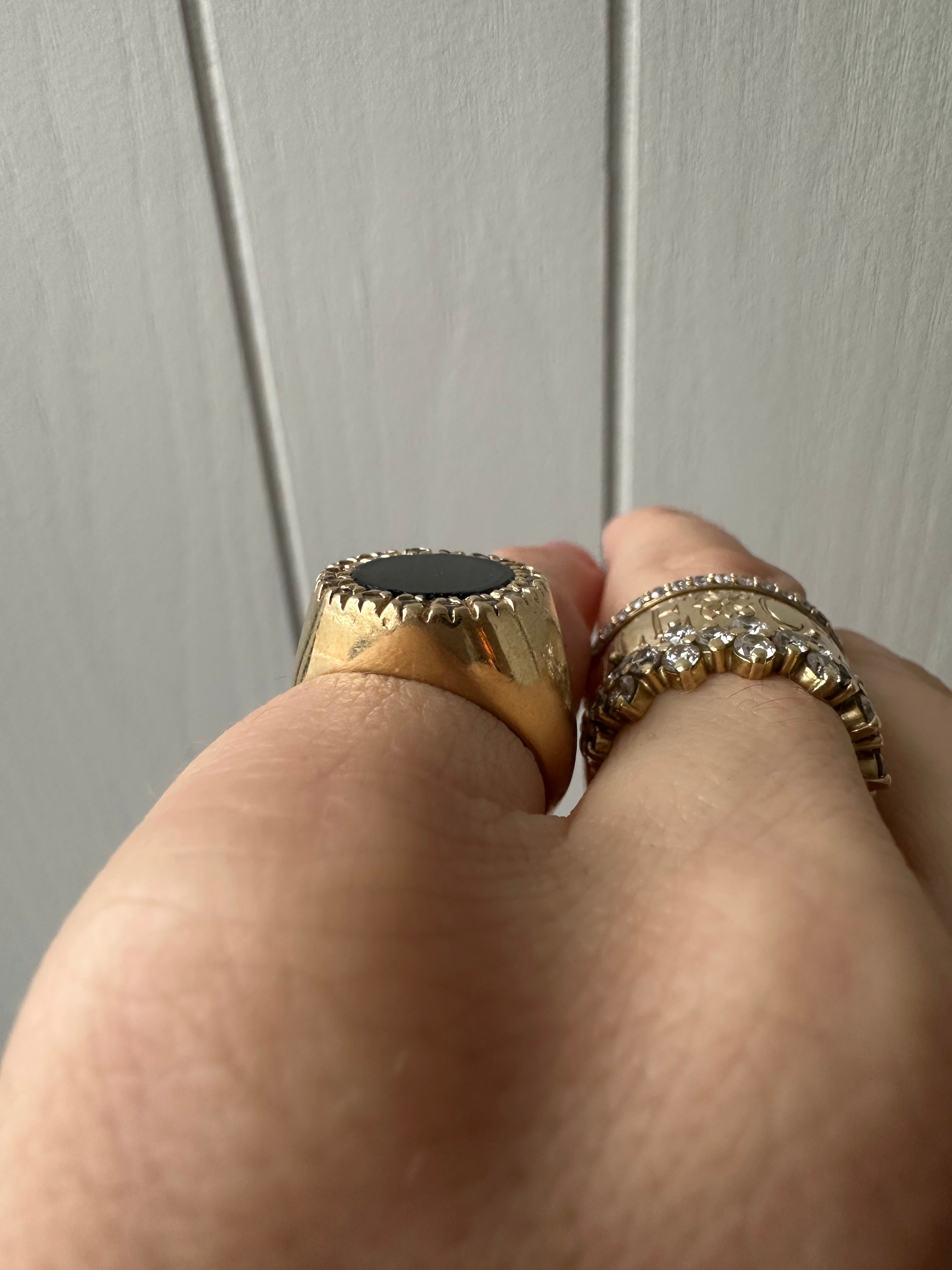 onyx and diamond oval signet style ring