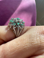 emerald and diamond burst ring